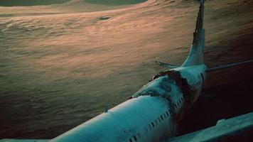 abandoned crushed plane in desert photo