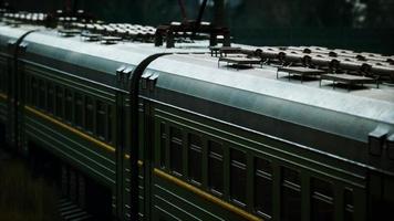 cargo trains in old train depot left to be rusted photo