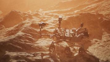 Curiosity Mars Rover exploring the surface of red planet. Elements of this image furnished by NASA photo