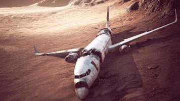 abandoned crushed plane in desert photo