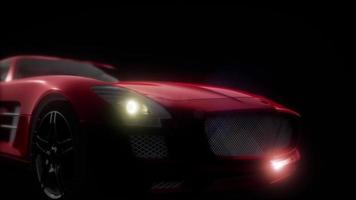 luxury sport car in dark studio with bright lights photo