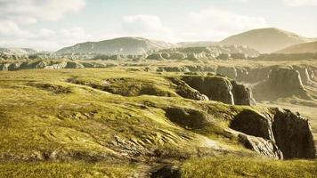 Mountain scenery with dry grass in Afghanistan photo