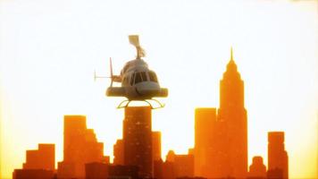 Silhouette helicopter at city scape background photo