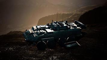 old military vehicle in Afghanistan mountains photo
