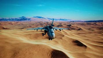 american military plane over the desert photo