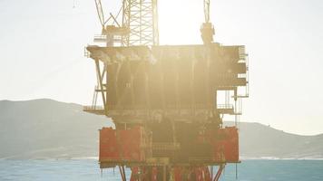 oil drill rig platform on the sea photo