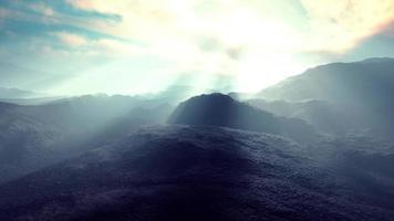 Mountain in the fog and stone desert photo