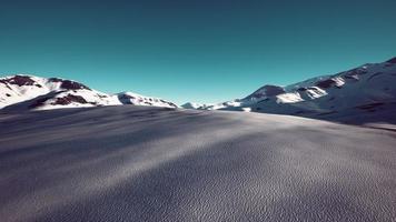 Snow covered volcanic crater in Iceland photo