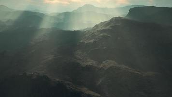 Black stone field in dense fog in highlands photo