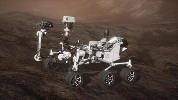 Curiosity Mars Rover exploring the surface of red planet. Elements of this image furnished by NASA photo