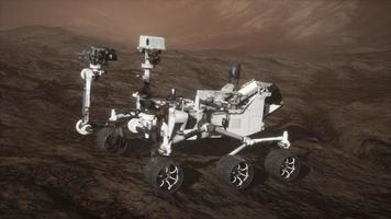 Curiosity Mars Rover exploring the surface of red planet. Elements of this image furnished by NASA photo