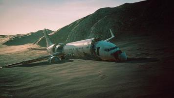 abandoned crushed plane in desert photo