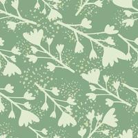 Floral seamless pattern with branches and flowers. Pastel green background with splashes. vector