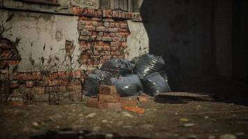 Abandoned factory with concrete ruins in industrial district photo