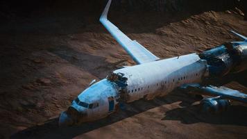 abandoned crushed plane in desert photo