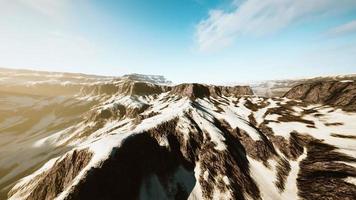 lava rock and snow in winter time in Iceland photo