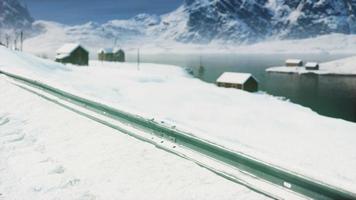 old worn abandoned house in norwegian winter landscape photo