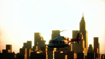 Silhouette helicopter at city scape background photo