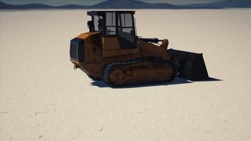 road grading machine on the salt desert road video