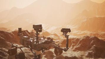 Curiosity Mars Rover exploring the surface of red planet. Elements of this image furnished by NASA photo