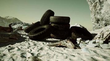 old abandoned tyres on sea shore video