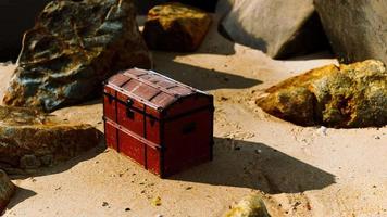treasure chest in sand dunes on a beach video