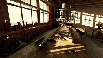 Retro stylized old tools on wooden table in a joinery photo