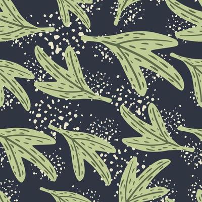 Abstract seamless random pattern with light green leaf shapes. Navy blue background with splashes.