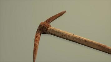 Close up of an old rusted pickaxe head photo