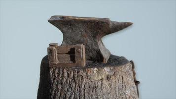 Old rusty anvil from the village forge photo