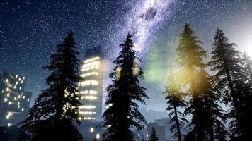 city skyscrapes at night with Milky Way stars video