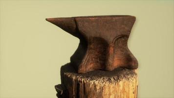 Old rusty anvil from the village forge photo