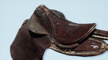 old used vintage leather dressage horse saddle photo