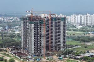 aerial view of New Building construction in Dwarka Expressway, construction of a building with cranes. photo