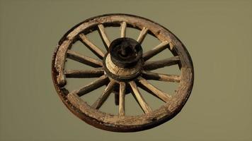 Handmade rustic vintage wooden wheel used in medieval wagons photo