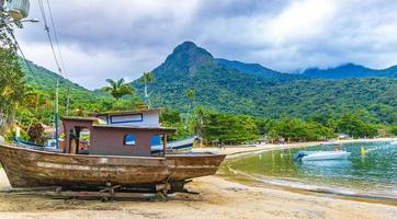 Old boats ships for restoration Abraao beach Ilha Grande Brazil. photo