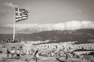 Athens Greece 04. October 2018 Greek blue white flag with ruins Acropolis of Athens Greece. photo