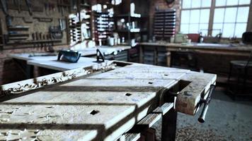 Retro stylized old tools on wooden table in a joinery video