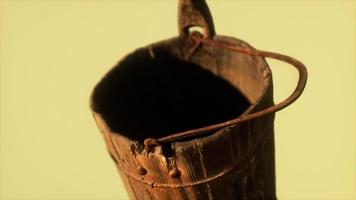 Old used rusted wooden bucket video