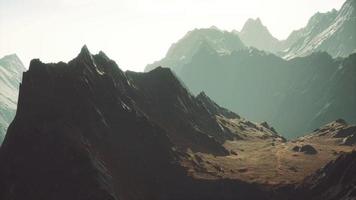 Rocks covered with grass under a cloudy sky video