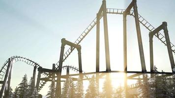 old roller coaster at sunset in forest video