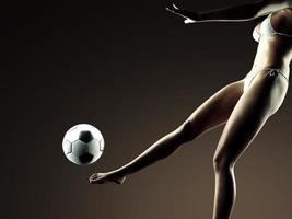 joven mujer sexy futbolista foto