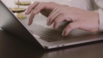 Lawyer working with new modern computer in office in slow motion video