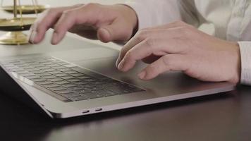 Lawyer working with new modern computer in office in slow motion video