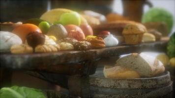 food table with wine barrels and some fruits, vegetables and bread video