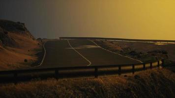 atlantic ocean road near the mountain photo