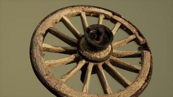 Handmade rustic vintage wooden wheel used in medieval wagons photo