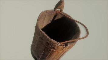 Old used rusted wooden bucket photo
