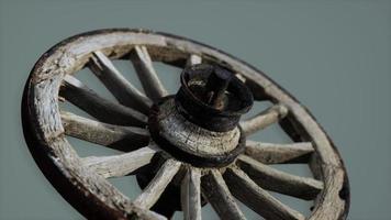 Handmade rustic vintage wooden wheel used in medieval wagons photo