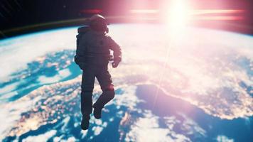 Astronaut in outer space over the planet Earth video